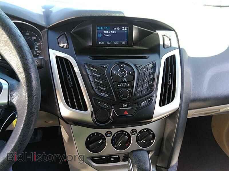 2014 Ford Focus - VIN: 1FADP3F21EL185761 - Фото 4