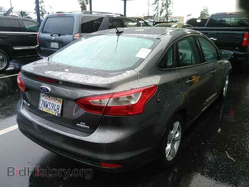 2014 Ford Focus - VIN: 1FADP3F24EL323227 - Фото 2