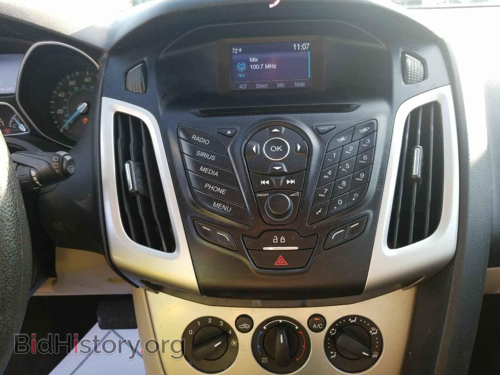 2014 Ford Focus - VIN: 1FADP3K29EL304744 - Фото 4