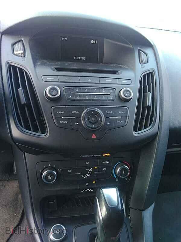 2015 Ford Focus - VIN: 1FADP3F24FL231990 - Photo 4