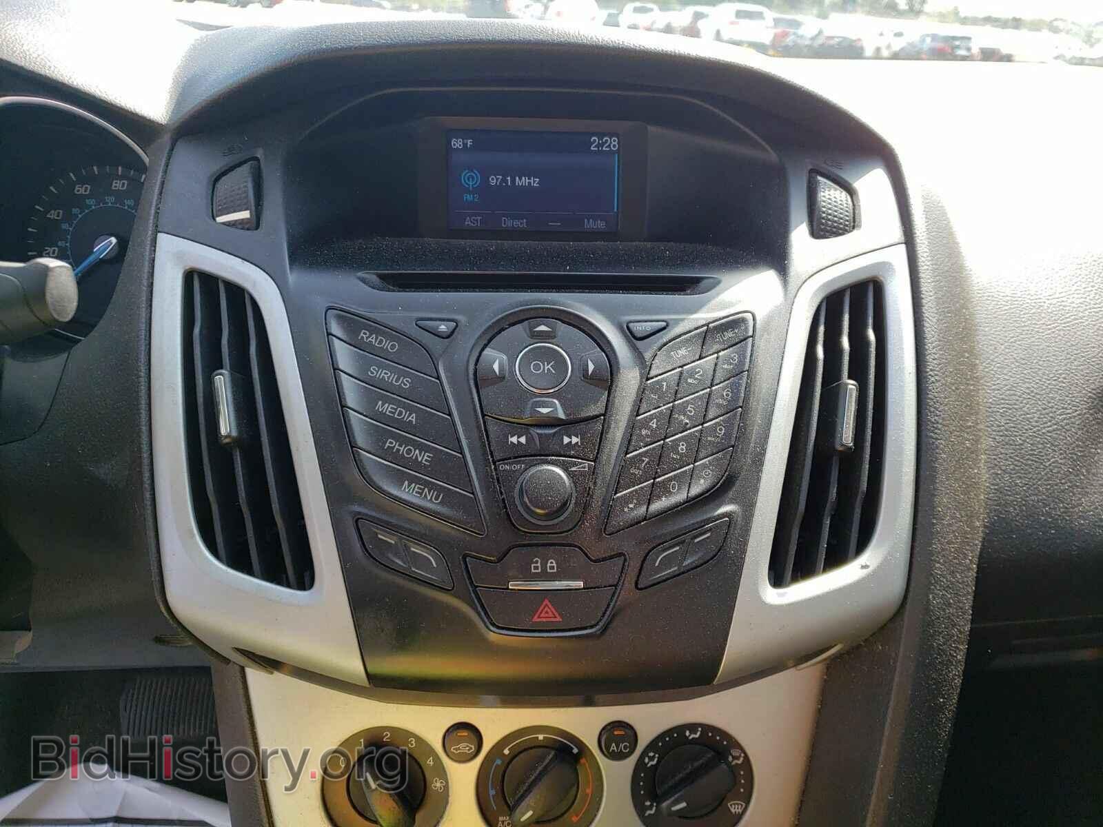 2014 Ford Focus - VIN: 1FADP3F24EL396209 - Фото 4