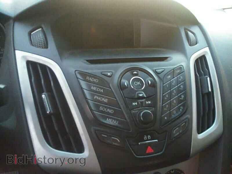 2014 Ford Focus - VIN: 1FADP3F20EL317084 - Photo 4