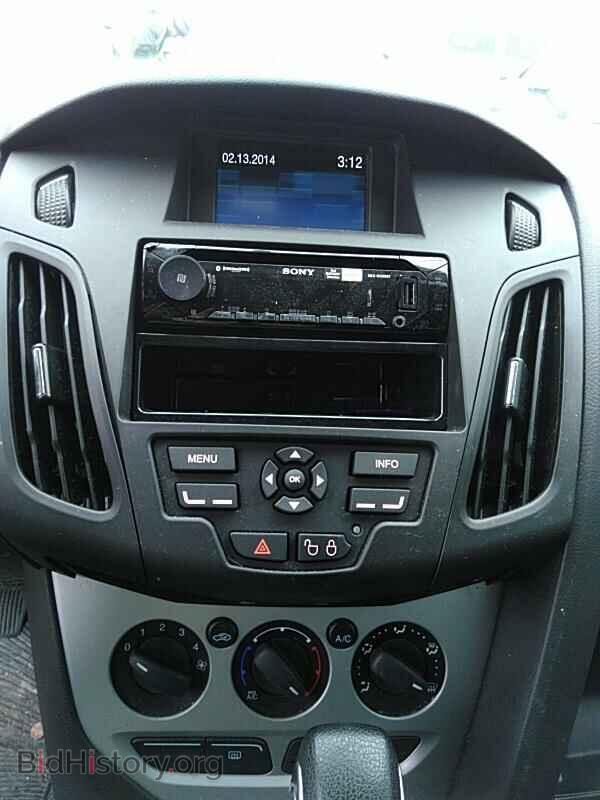 2014 Ford Focus - VIN: 1FADP3F26EL217295 - Фото 4