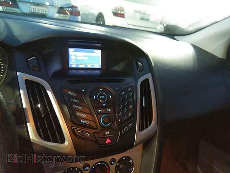 2014 Ford Focus - VIN: 1FADP3F20EL260871 - Photo 4