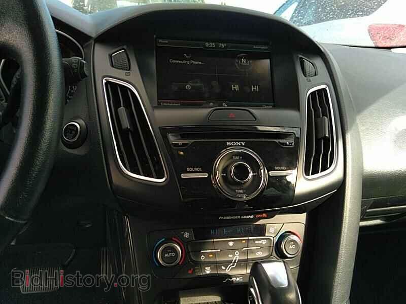 2015 Ford Focus - VIN: 1FADP3N27FL314671 - Photo 4