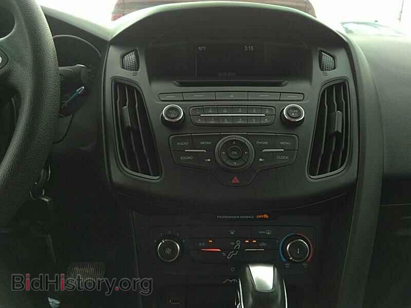 2015 Ford Focus - VIN: 1FADP3F20FL249726 - Photo 4