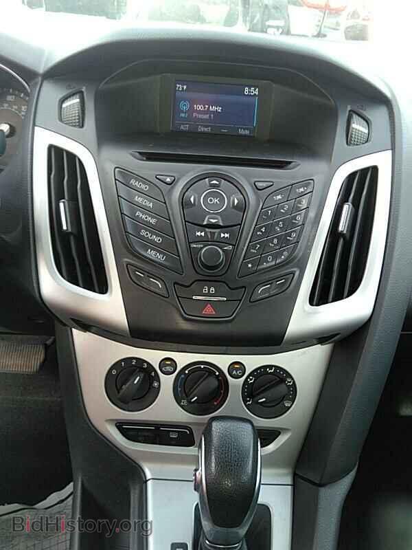 2014 Ford Focus - VIN: 1FADP3F22EL434388 - Фото 4