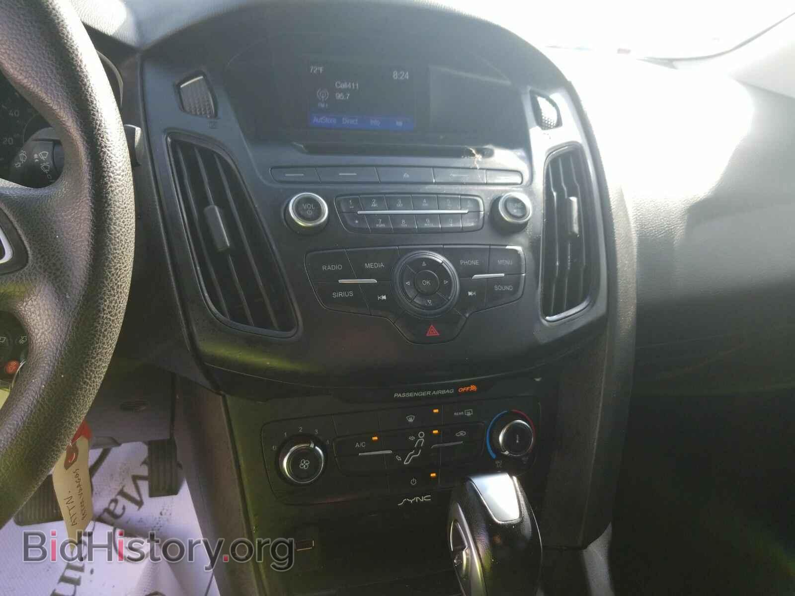 2015 Ford Focus - VIN: 1FADP3F20FL228648 - Photo 4