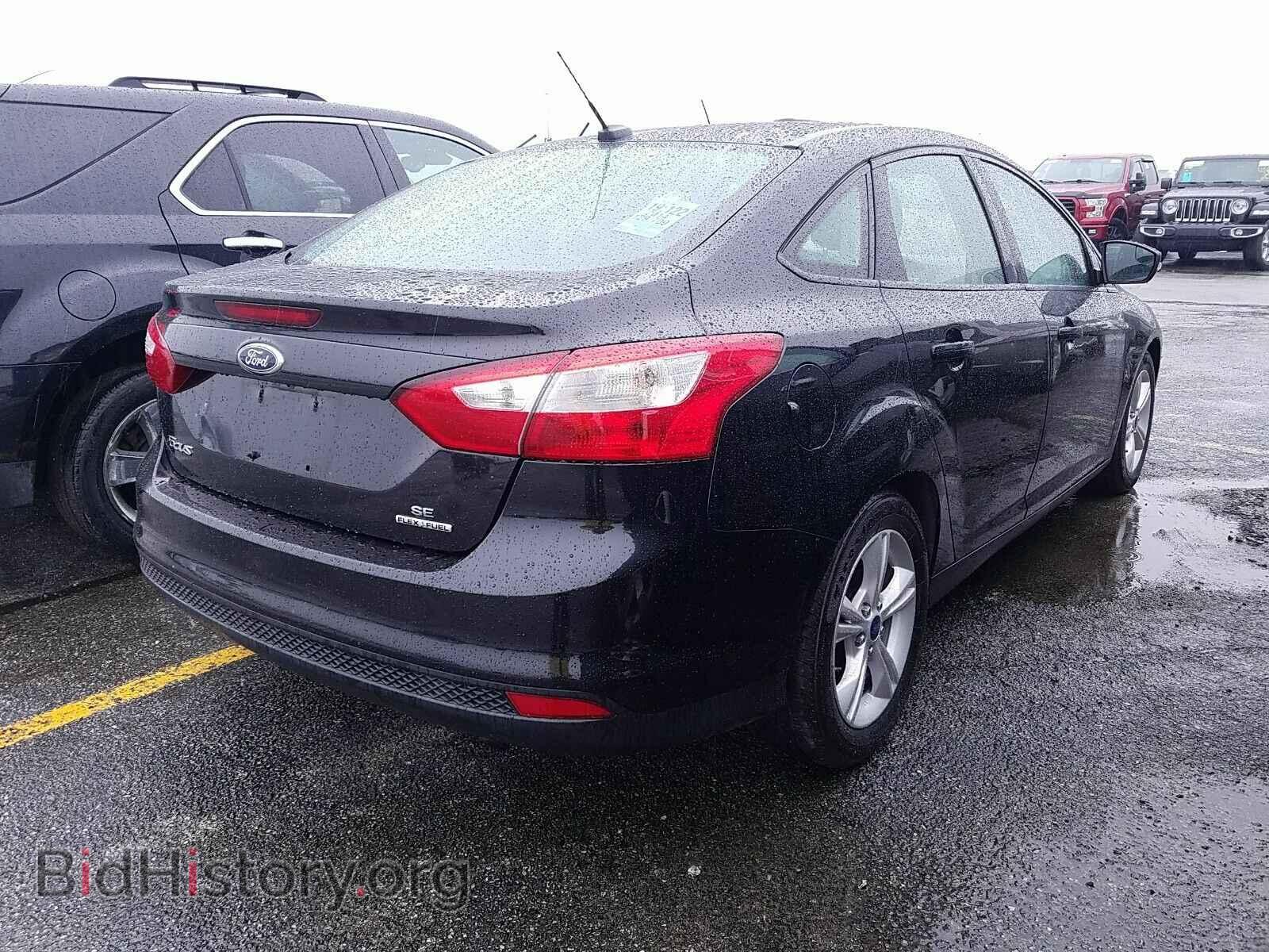 2014 Ford Focus - VIN: 1FADP3F22EL417896 - Фото 2