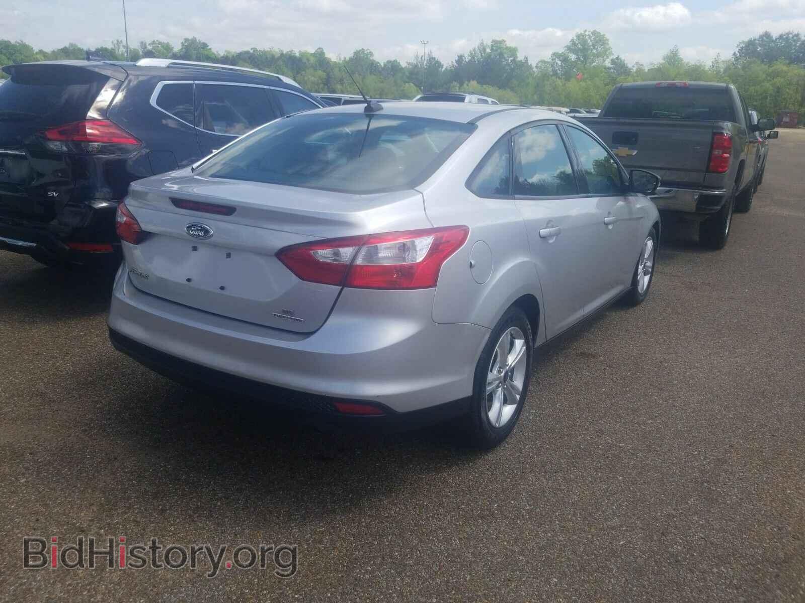 2014 Ford Focus - VIN: 1FADP3F25EL214100 - Фото 2