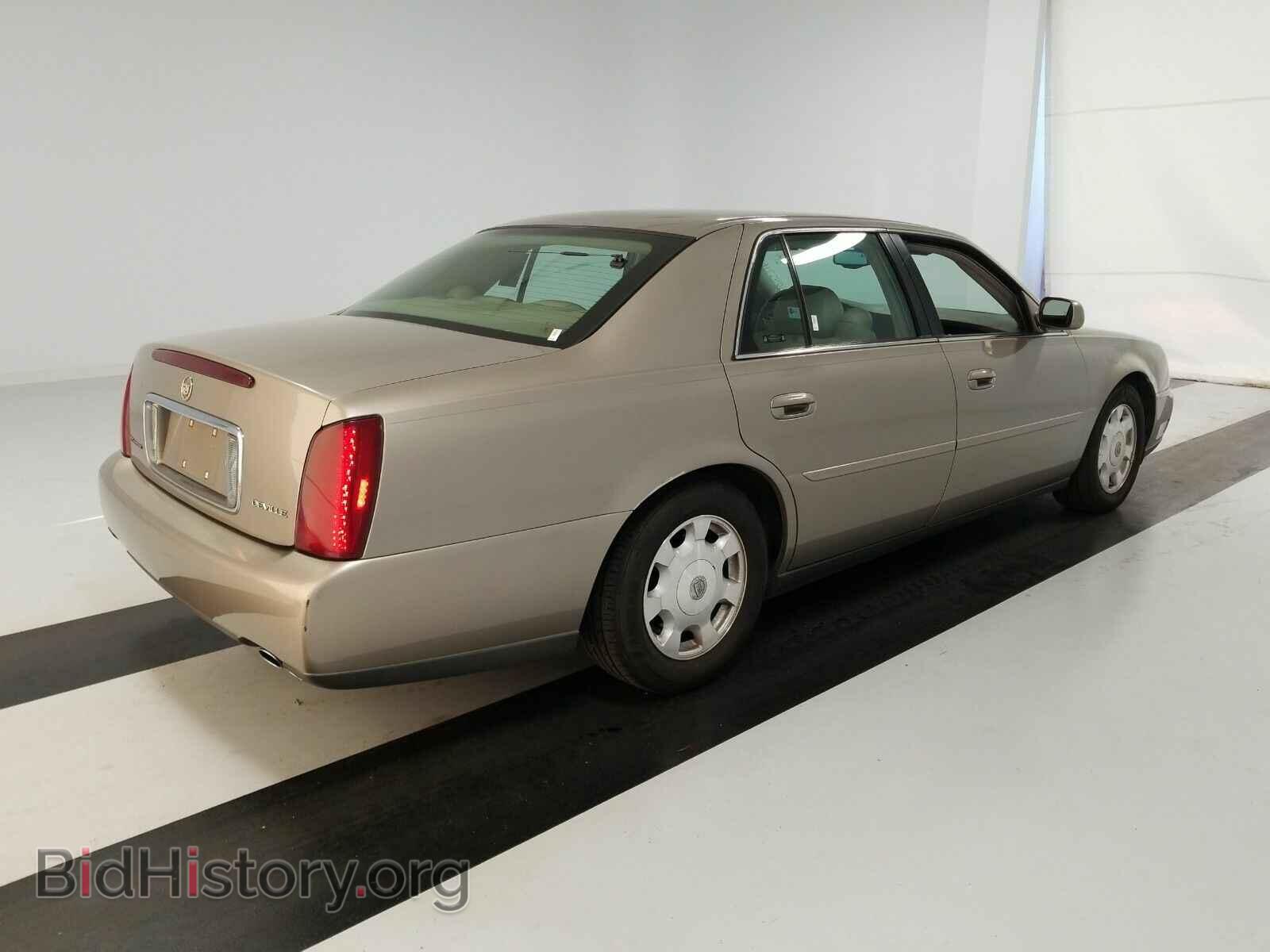 2002 Cadillac DeVille - VIN: 1G6KD54Y52U261049 - Photo 4