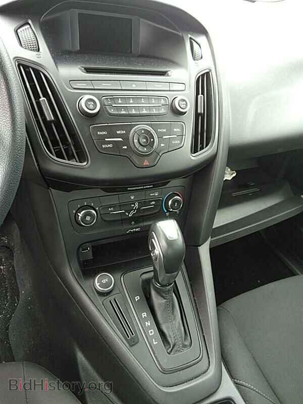 2015 Ford Focus - VIN: 1FADP3F27FL321778 - Photo 4