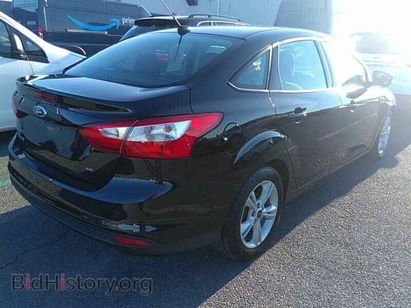 2014 Ford Focus - VIN: 1FADP3F24EL409248 - Фото 2