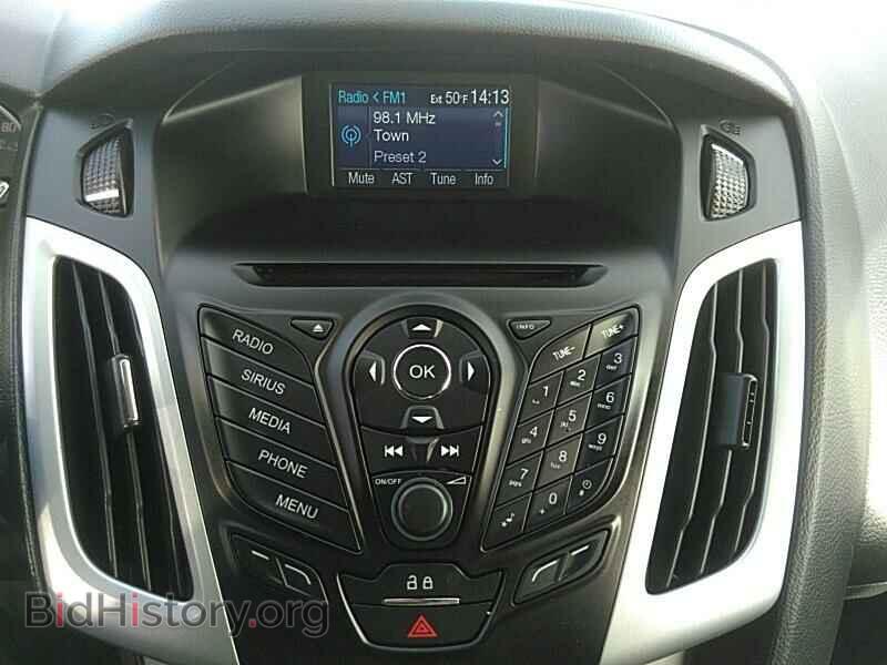 2014 Ford Focus - VIN: 1FADP3F27EL171797 - Фото 4
