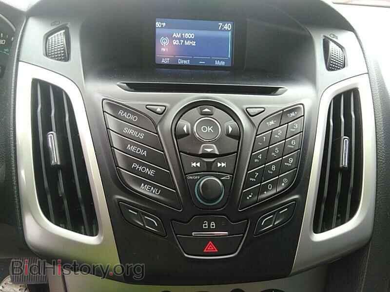 2014 Ford Focus - VIN: 1FADP3F21EL281535 - Фото 4