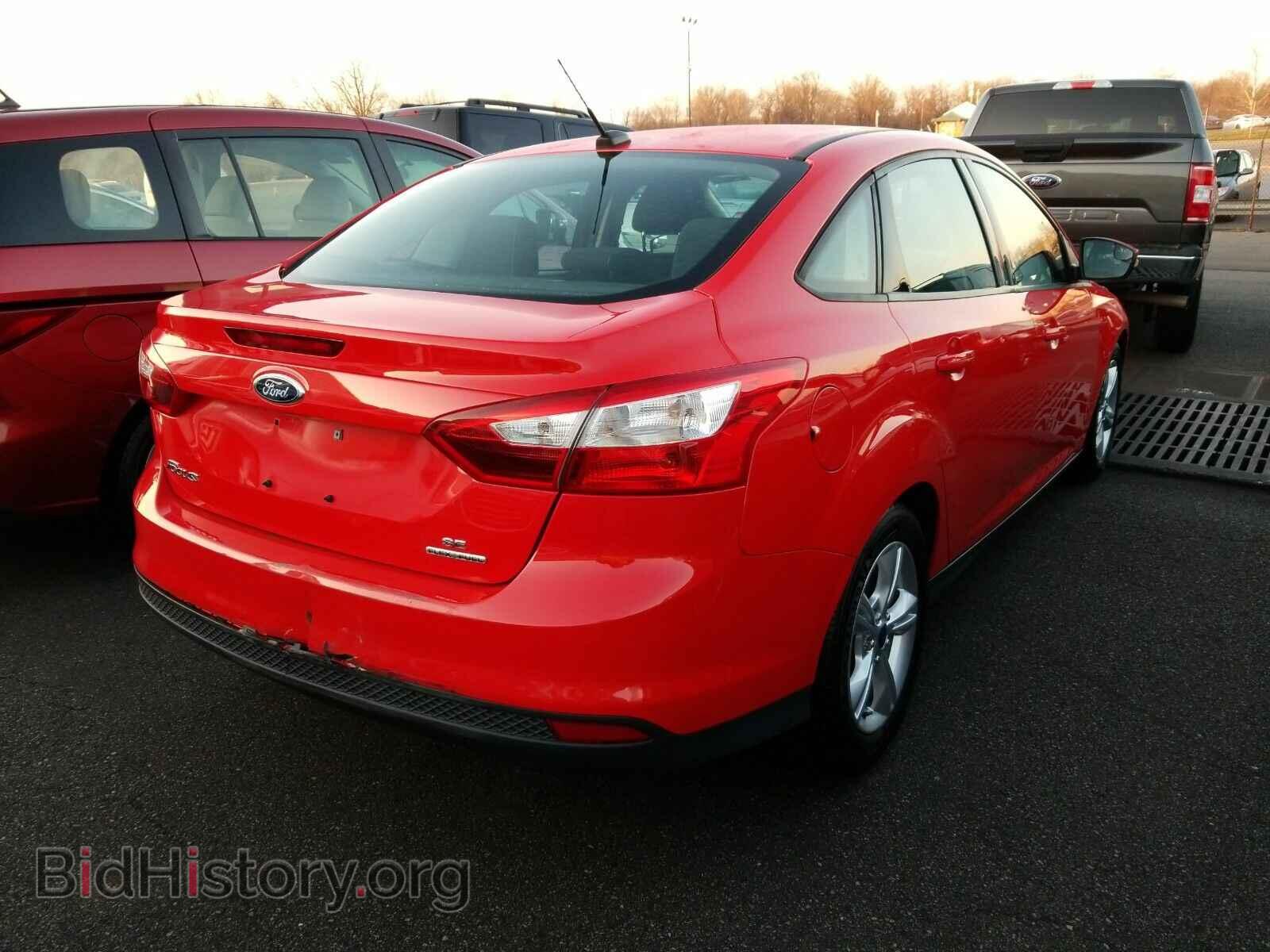 2014 Ford Focus - VIN: 1FADP3F21EL219973 - Фото 2