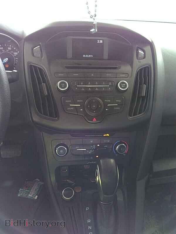 2015 Ford Focus - VIN: 1FADP3E22FL304582 - Photo 4