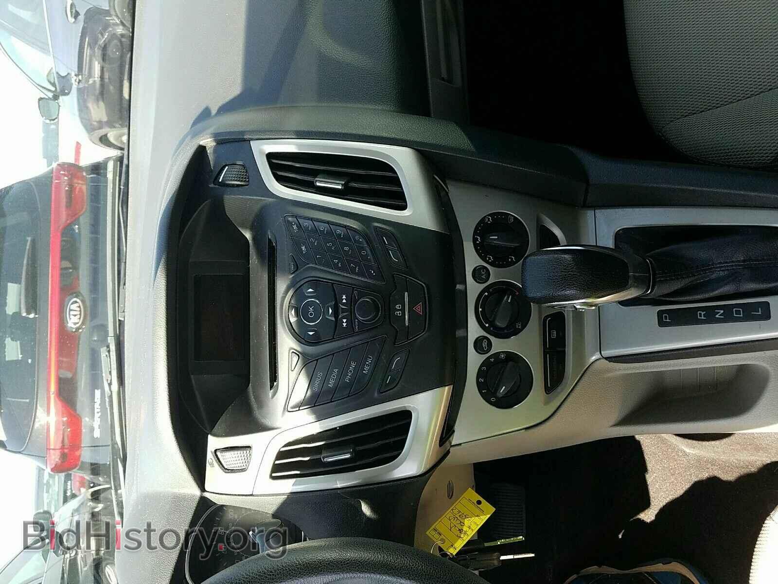 2014 Ford Focus - VIN: 1FADP3F29EL105963 - Фото 4