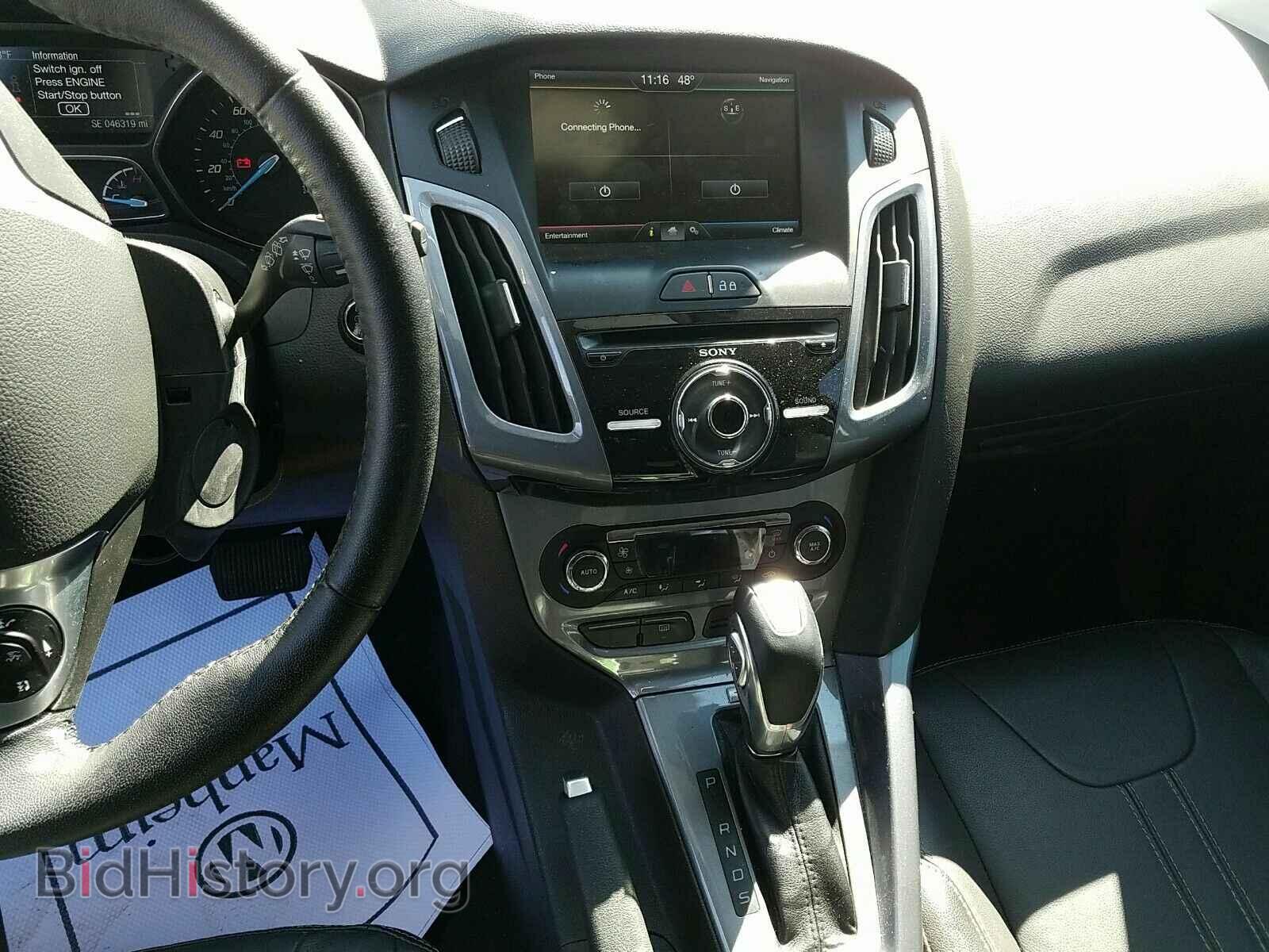 2014 Ford Focus - VIN: 1FADP3N20EL384060 - Photo 4