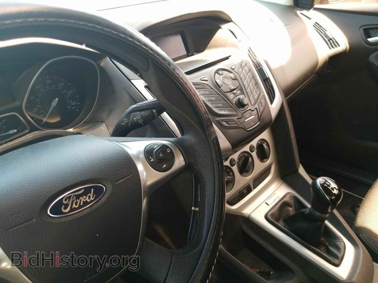 2014 Ford Focus - VIN: 1FADP3F27EL143675 - Фото 4