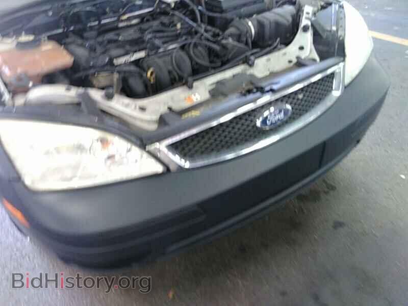 2007 Ford Focus - VIN: 1FAFP34N77W276234 - Фото 9