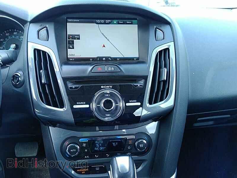 2014 Ford Focus - VIN: 1FADP3J28EL375337 - Photo 4