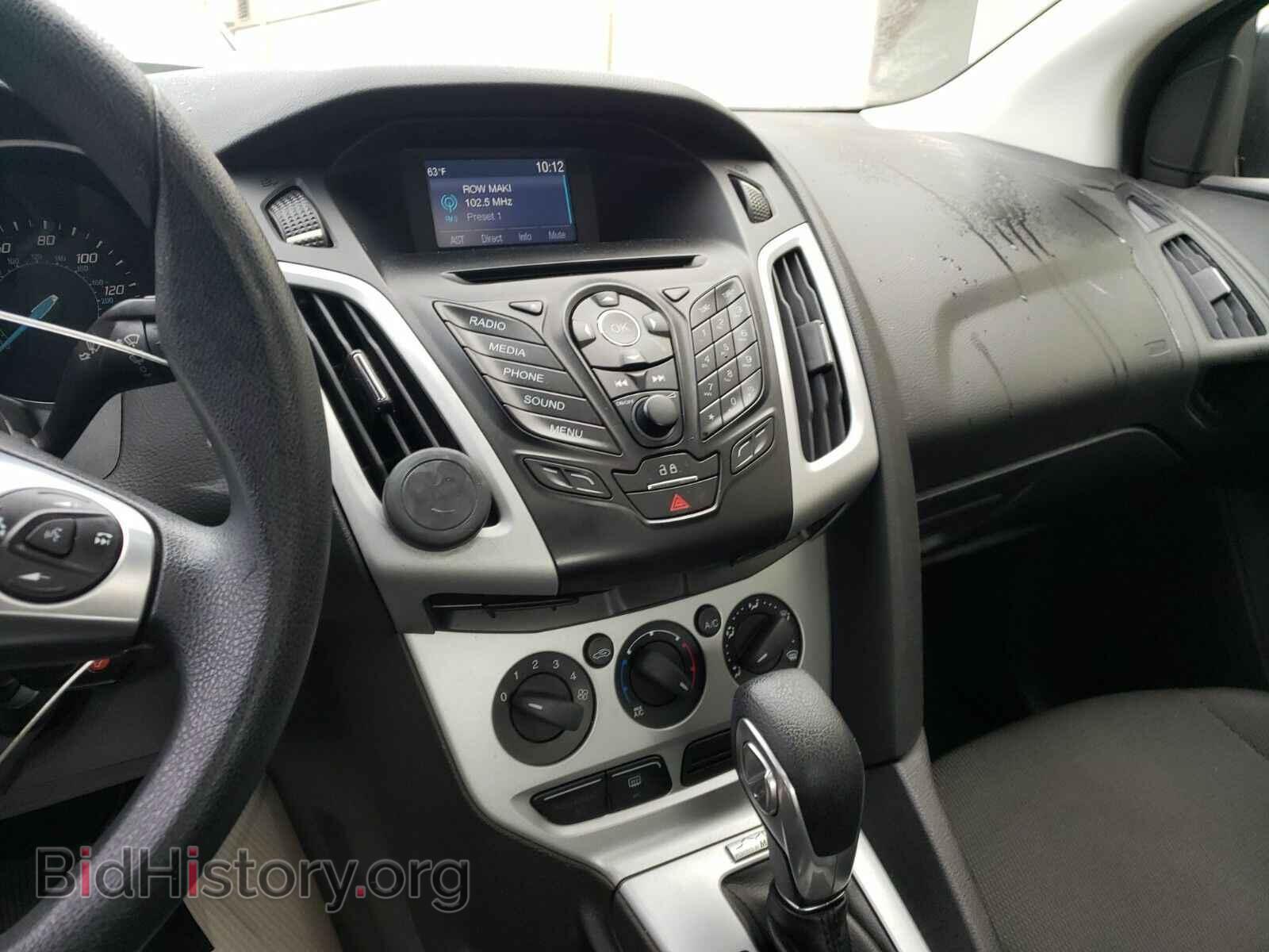 2014 Ford Focus - VIN: 1FADP3F26EL448780 - Photo 4