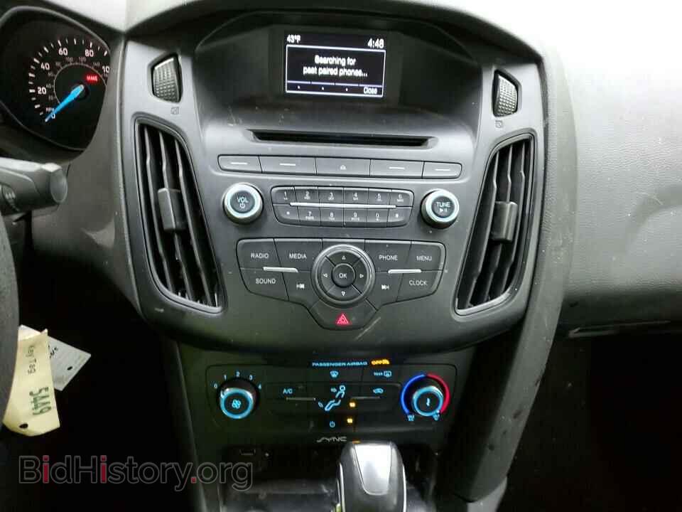 2015 Ford Focus - VIN: 1FADP3F21FL243045 - Photo 4