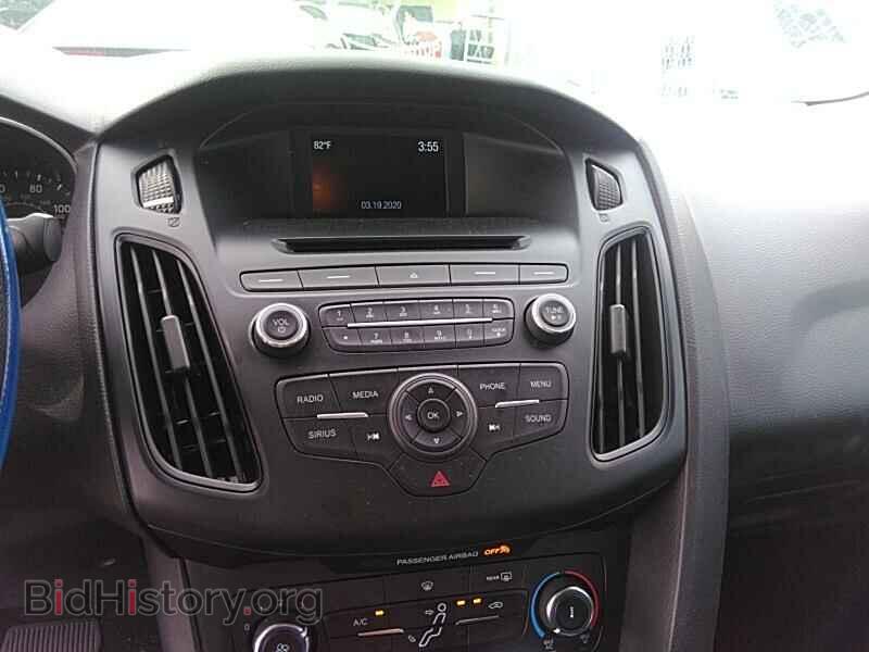2015 Ford Focus - VIN: 1FADP3F22FL214928 - Photo 4