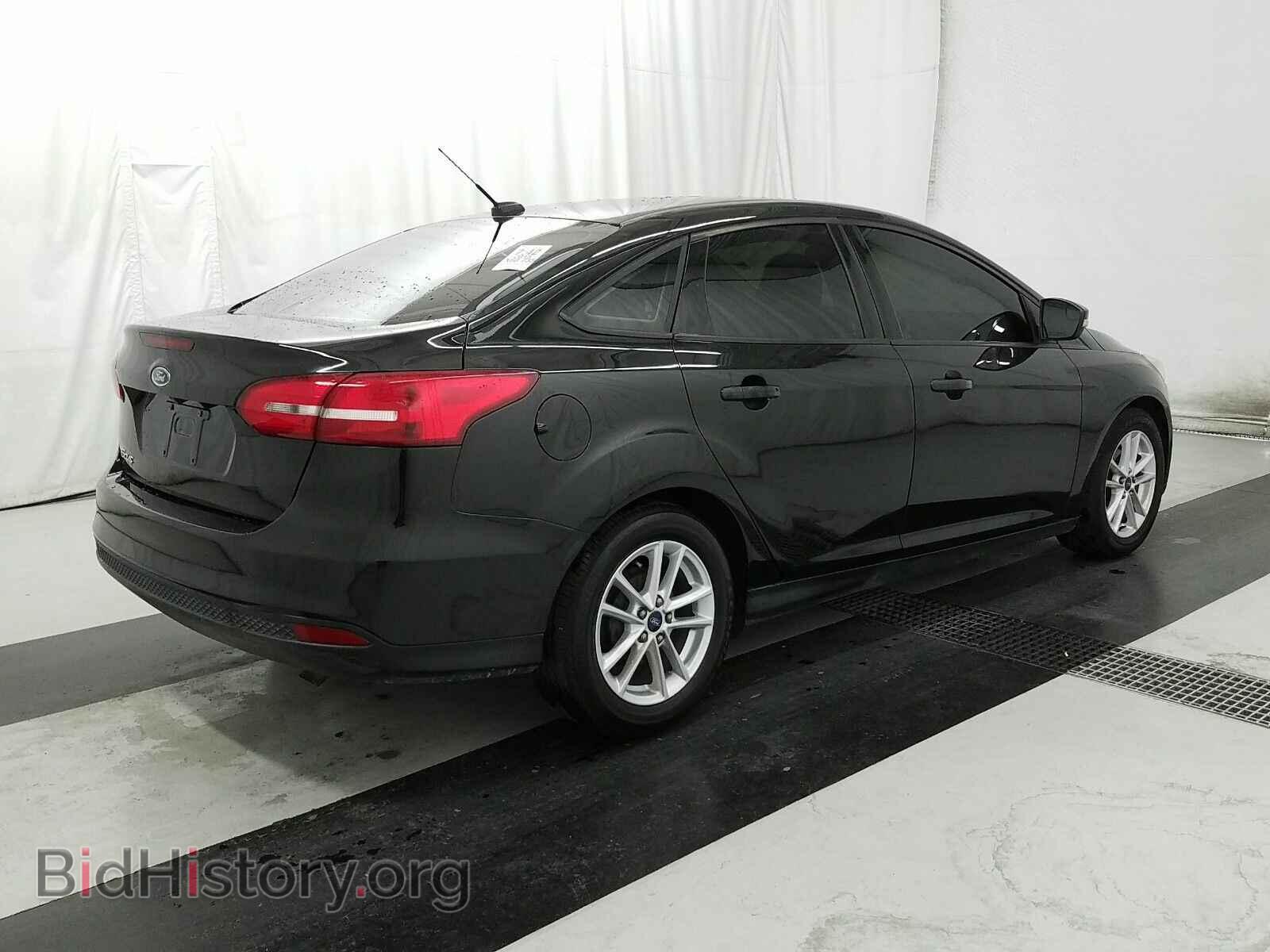 2015 Ford Focus - VIN: 1FADP3F24FL202991 - Фото 4