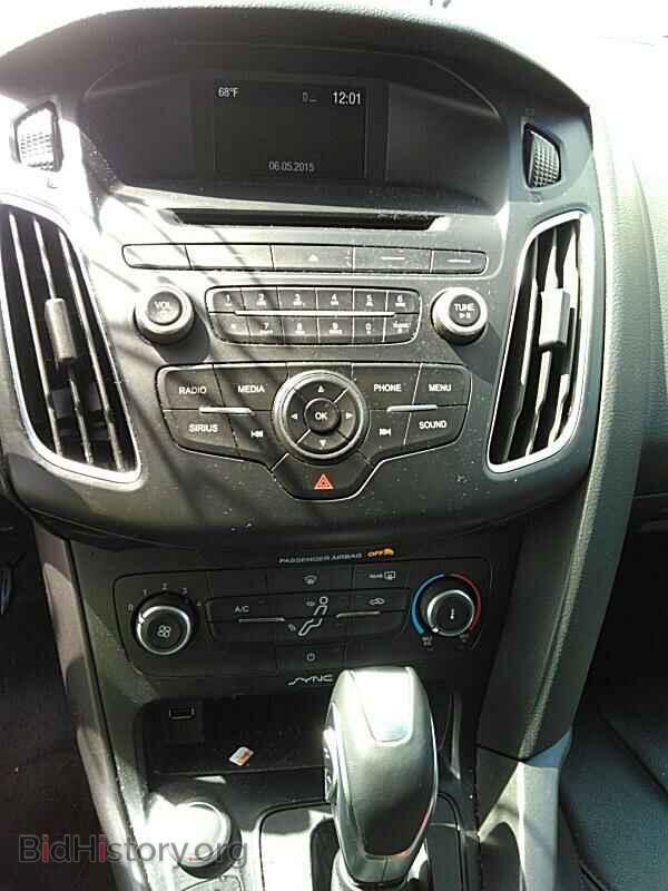 2015 Ford Focus - VIN: 1FADP3F29FL334595 - Фото 4