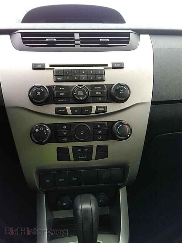 2008 Ford Focus - VIN: 1FAHP35N48W199010 - Фото 4