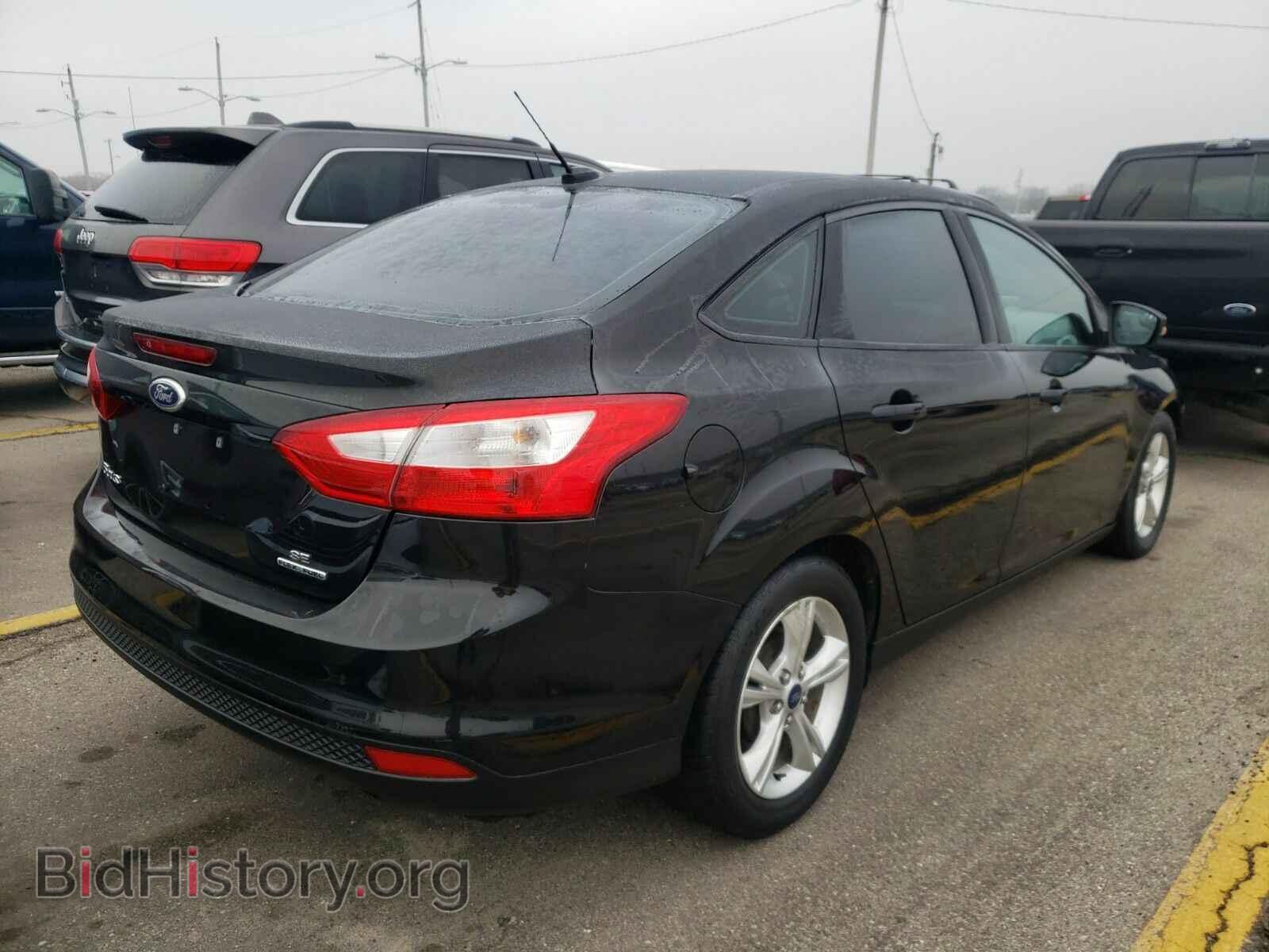 2014 Ford Focus - VIN: 1FADP3F24EL245841 - Photo 2