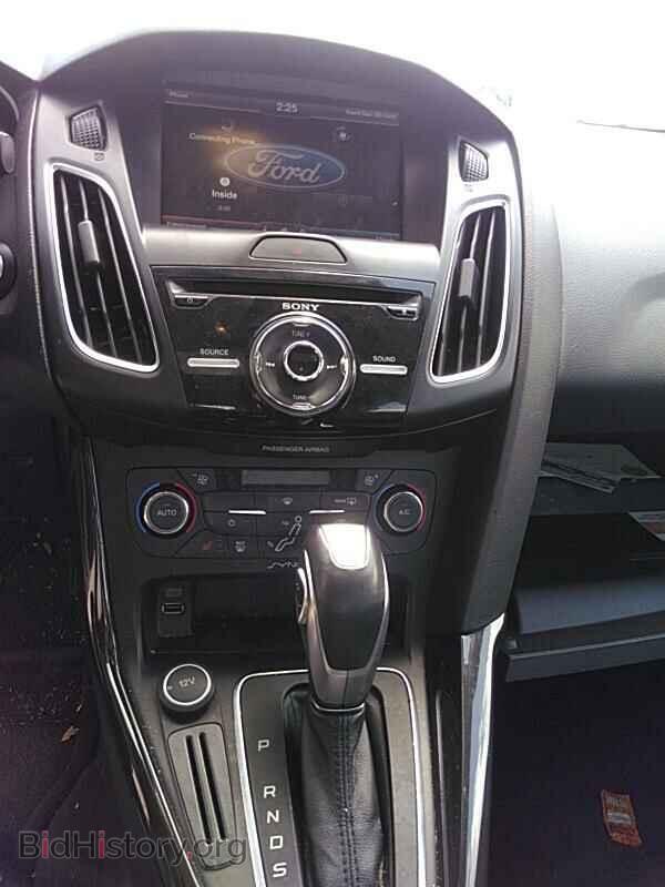 2015 Ford Focus - VIN: 1FADP3J24FL311507 - Photo 4
