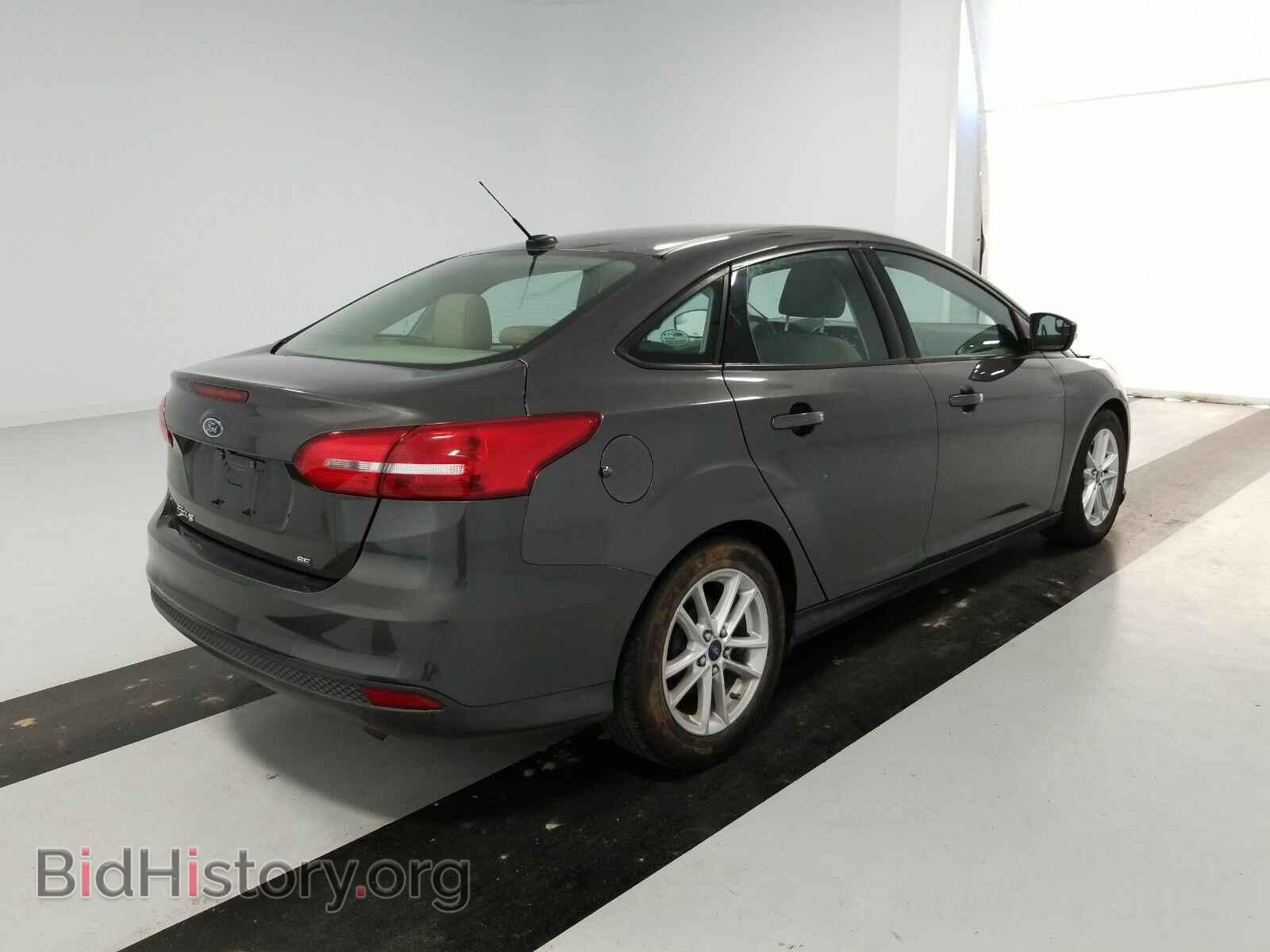 2016 Ford Focus - VIN: 1FADP3F23GL203602 - Photo 4