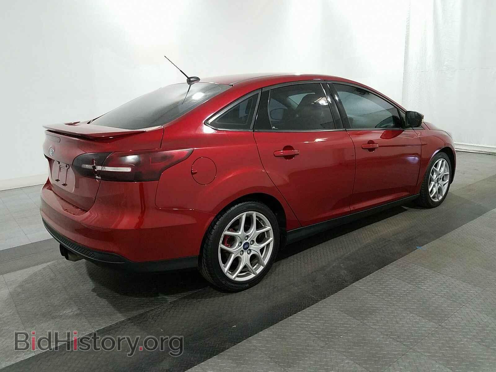 2015 Ford Focus - VIN: 1FADP3F21FL267488 - Photo 4