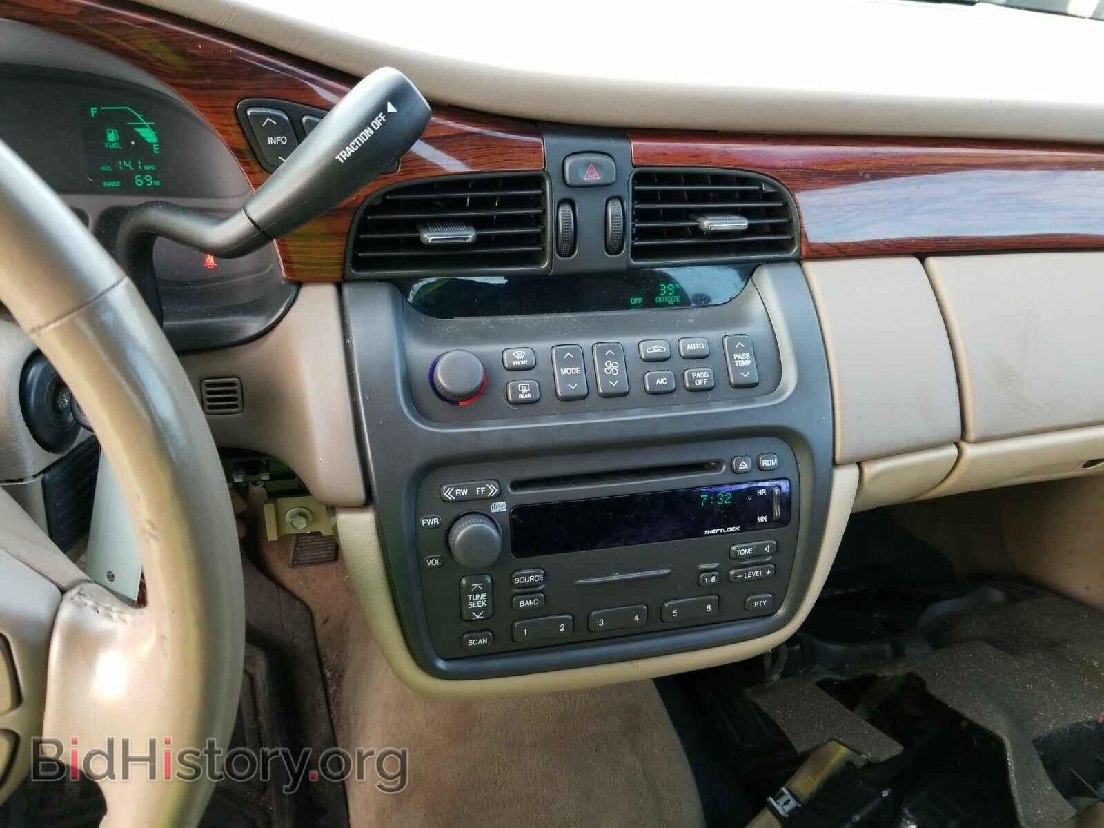 2004 Cadillac DeVille - VIN: 1G6KD54Y54U121697 - Photo 4