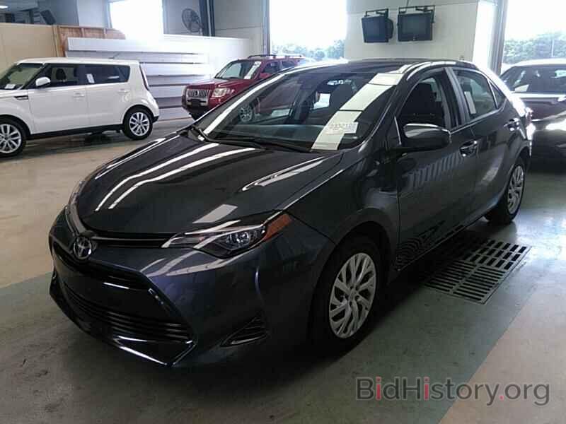 Photo 5YFBURHE9KP895899 - Toyota Corolla LE 2019