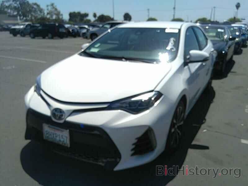 Photo 5YFBURHE8KP900123 - Toyota Corolla 2019