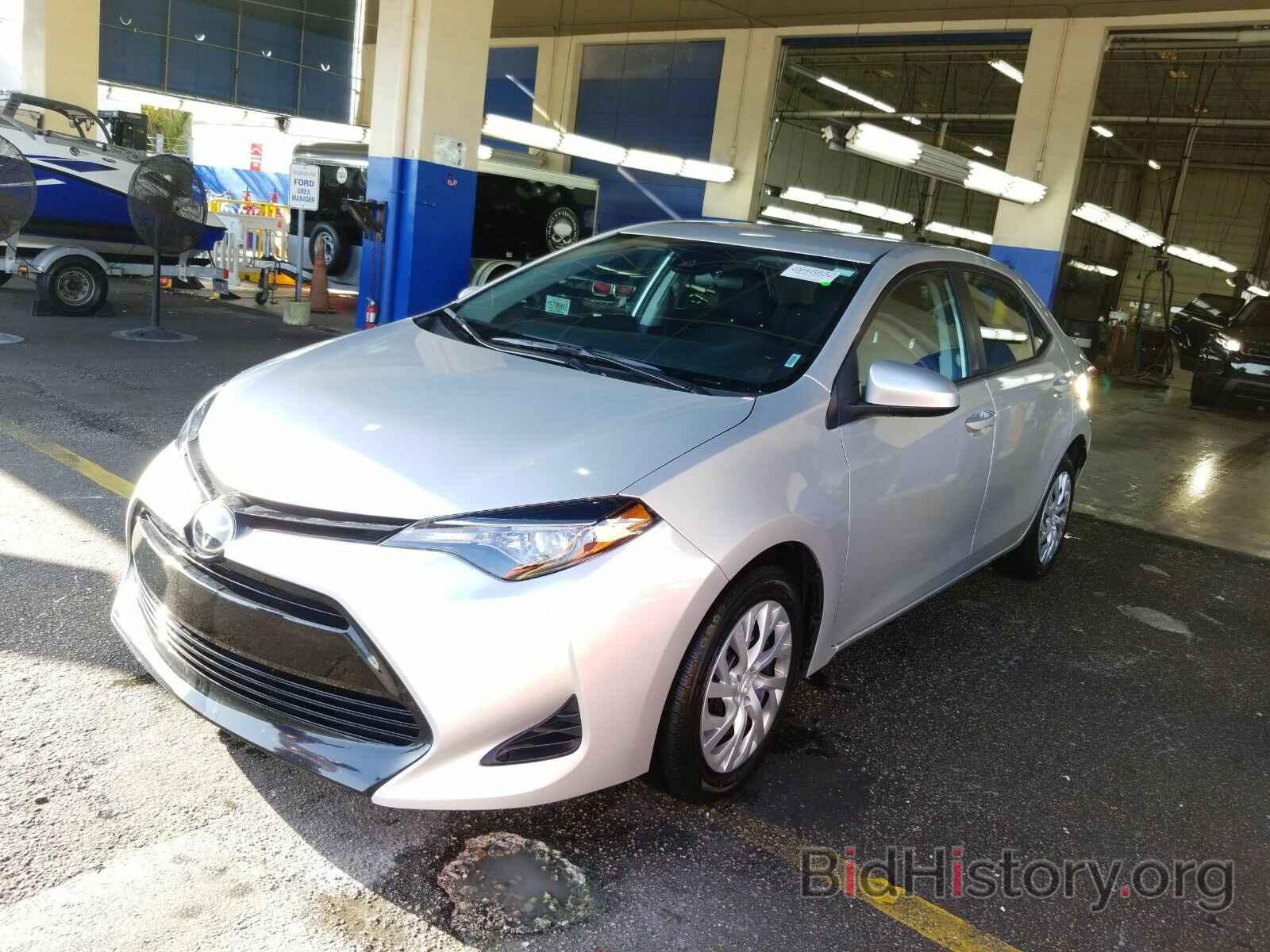 Photo 5YFBURHE3KP909277 - Toyota Corolla LE 2019