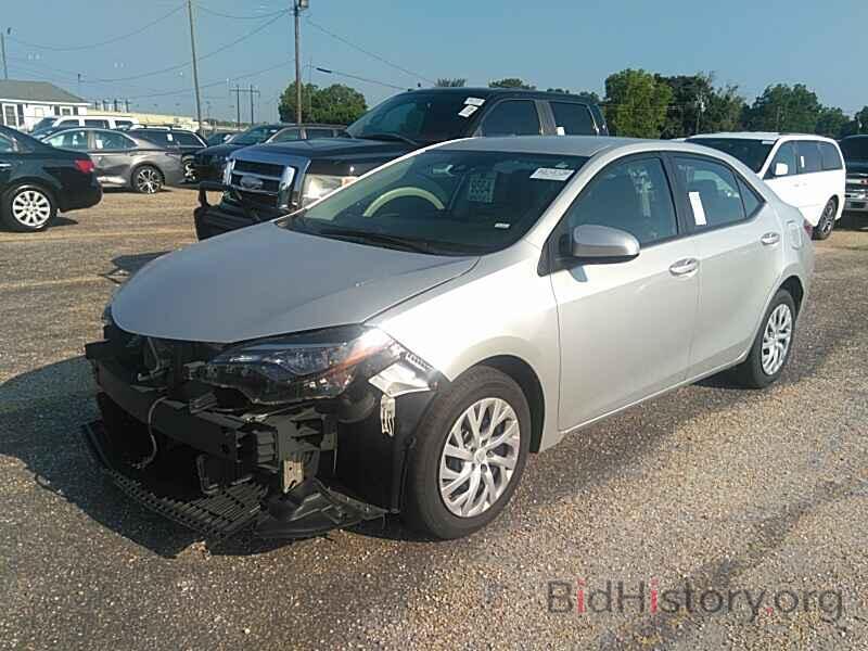 Photo 5YFBURHE2KP875459 - Toyota Corolla LE 2019