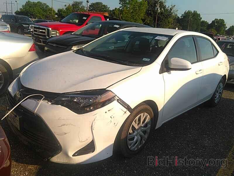 Photo 5YFBURHE9KP899791 - Toyota Corolla LE 2019