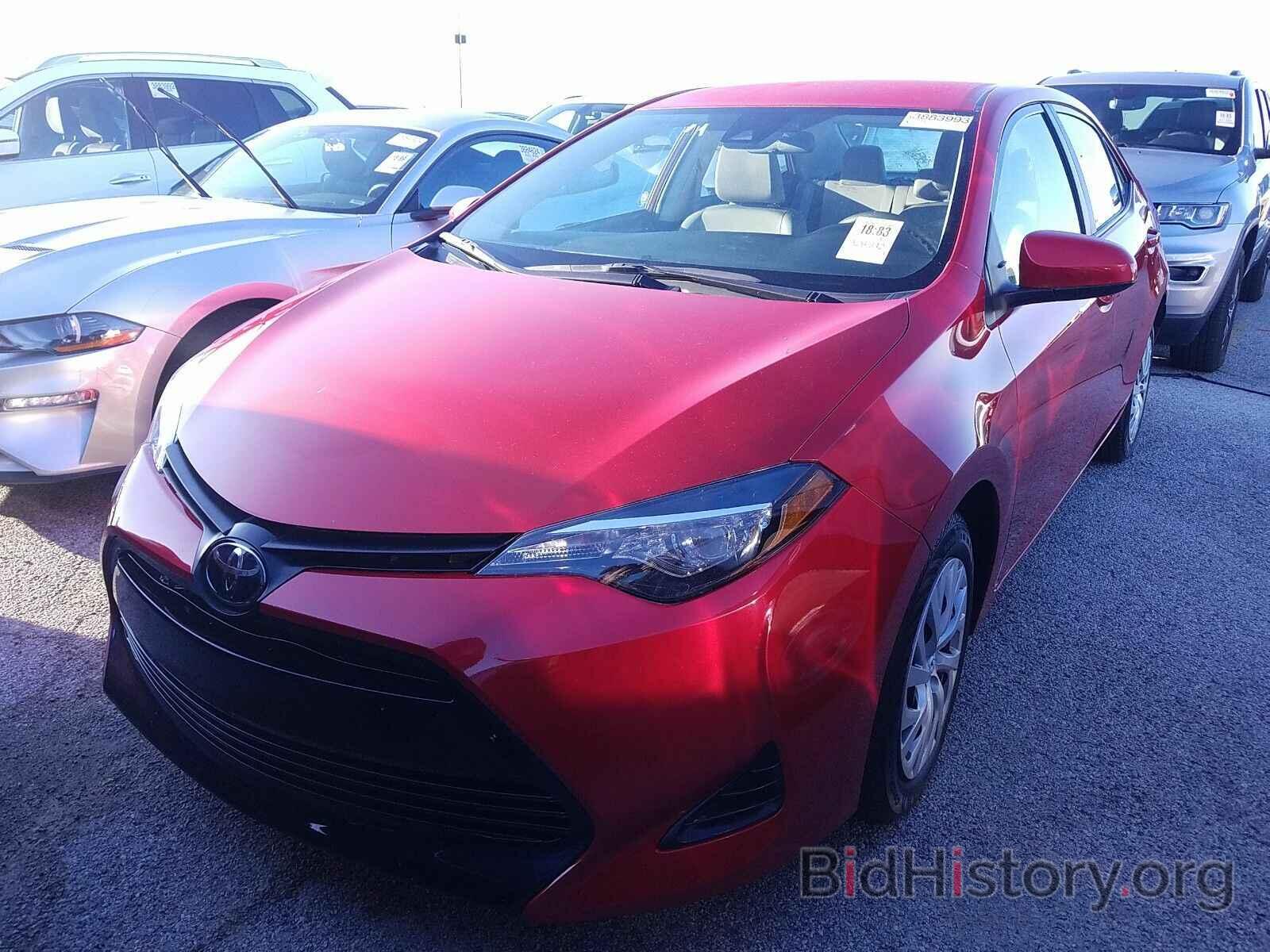 Photo 5YFBURHE8KP936765 - Toyota Corolla LE 2019