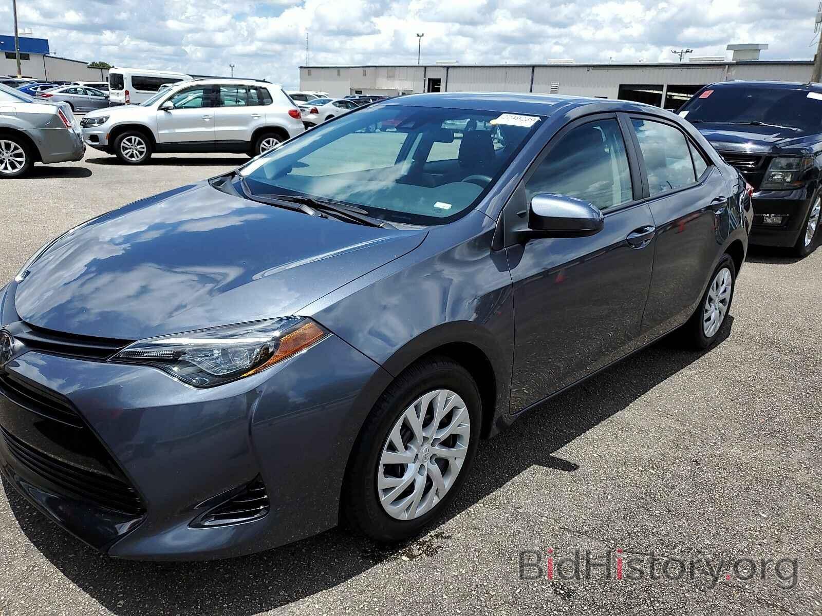 Photo 5YFBURHE7KP871973 - Toyota Corolla LE 2019