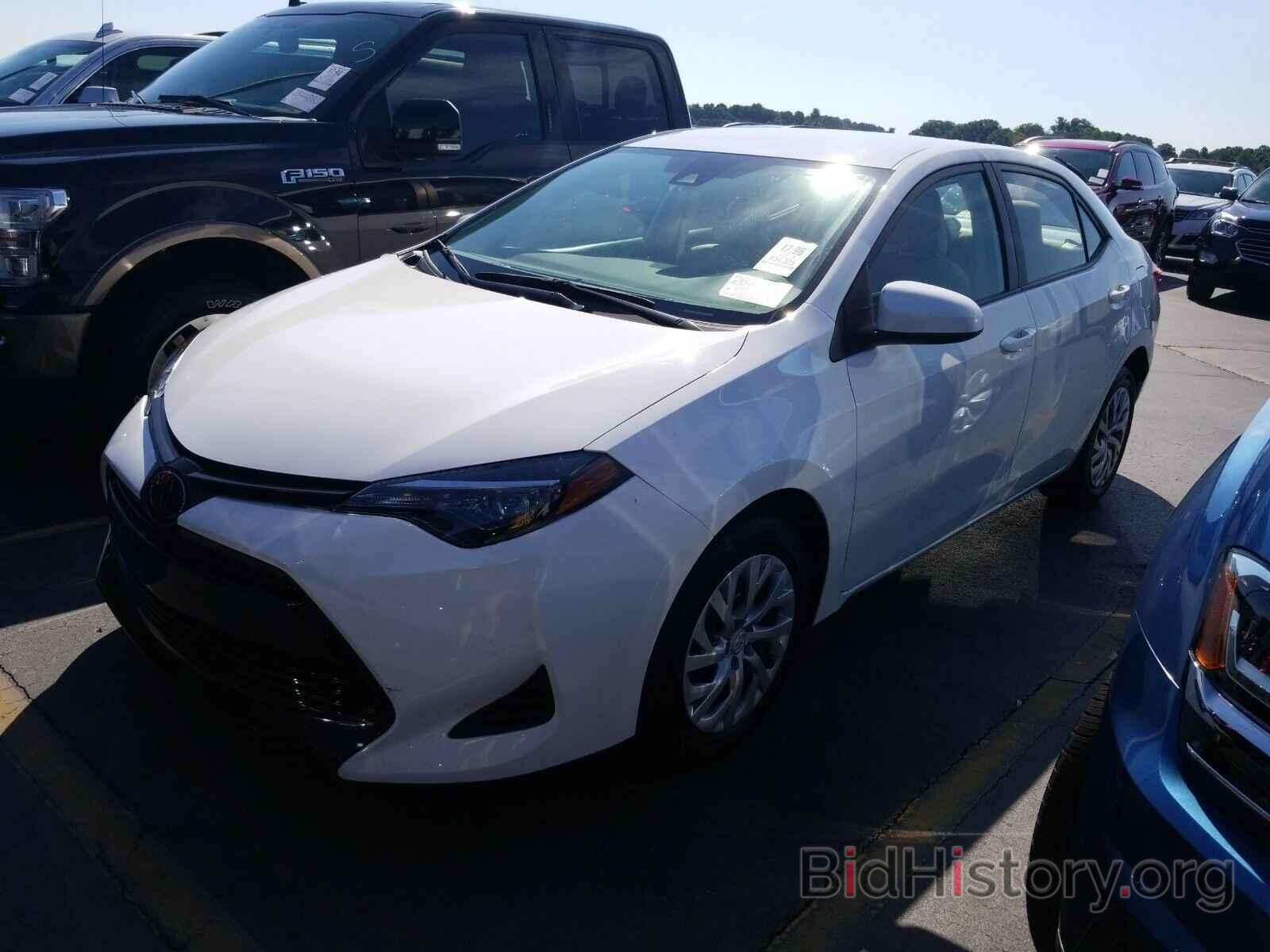 Photo 5YFBURHE2KP921209 - Toyota Corolla LE 2019