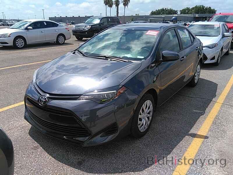 Photo 5YFBURHE0KP889389 - Toyota Corolla LE 2019