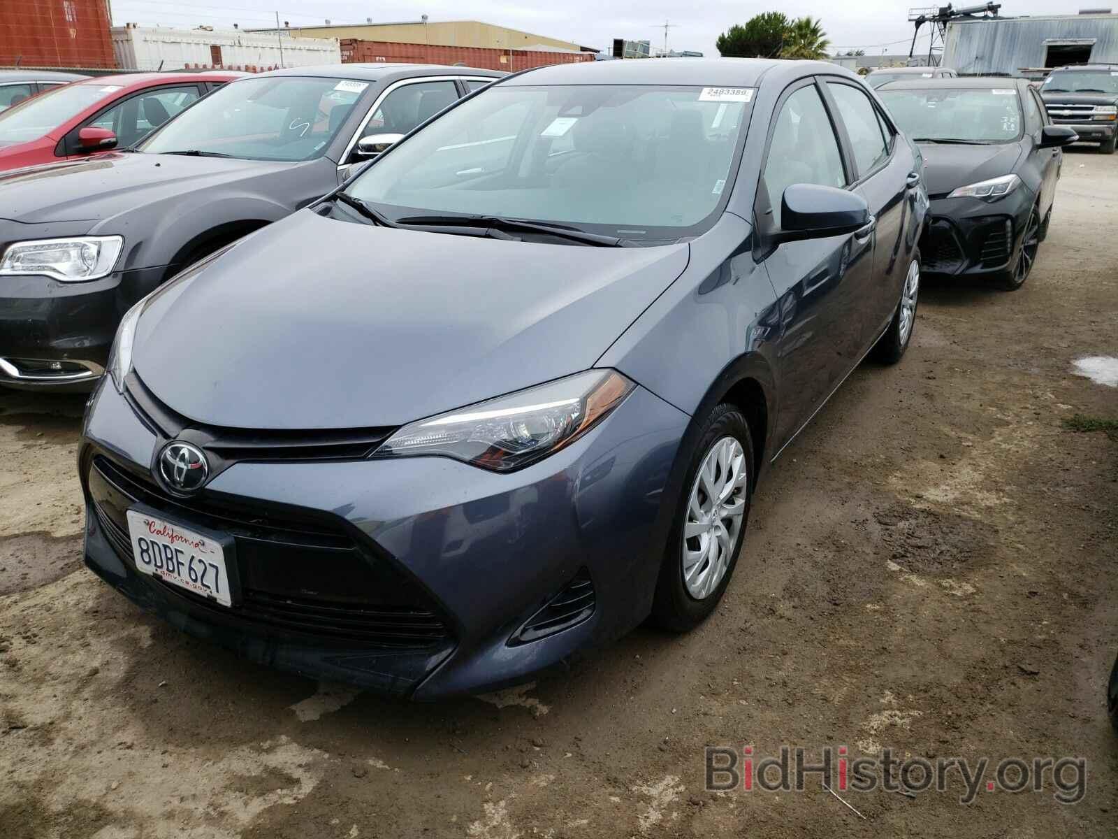 Photo 5YFBURHE3KP867449 - Toyota Corolla LE 2019