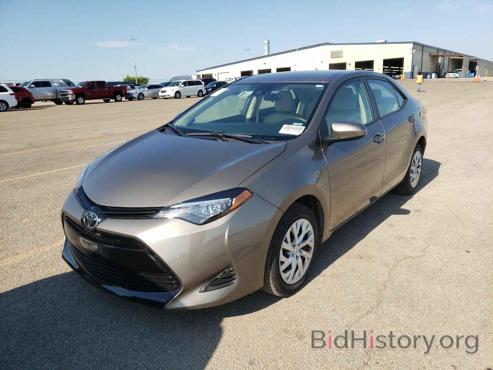 Photo 5YFBURHE3KP931358 - Toyota Corolla LE 2019