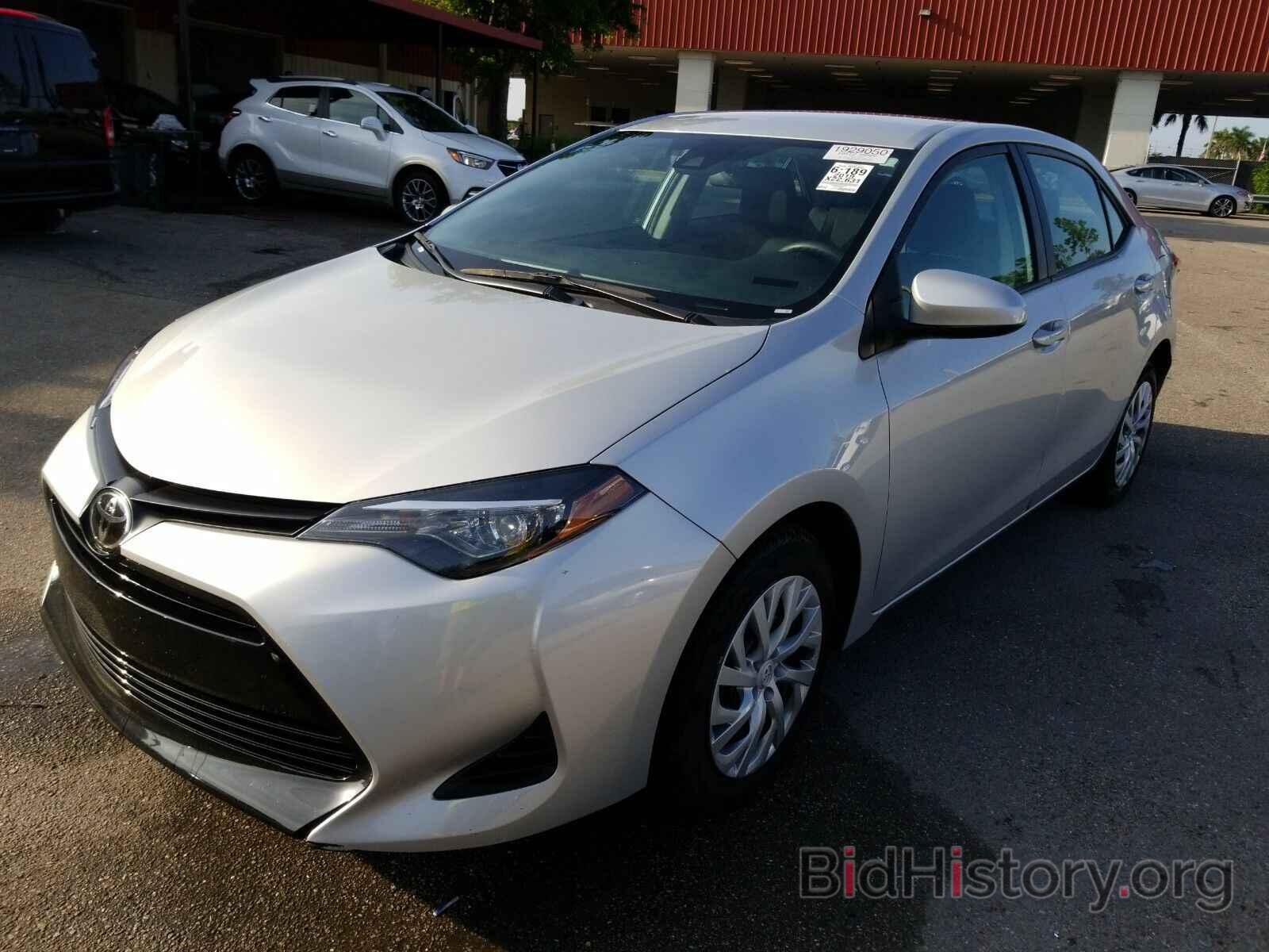 Photo 5YFBURHE2KP939919 - Toyota Corolla LE 2019