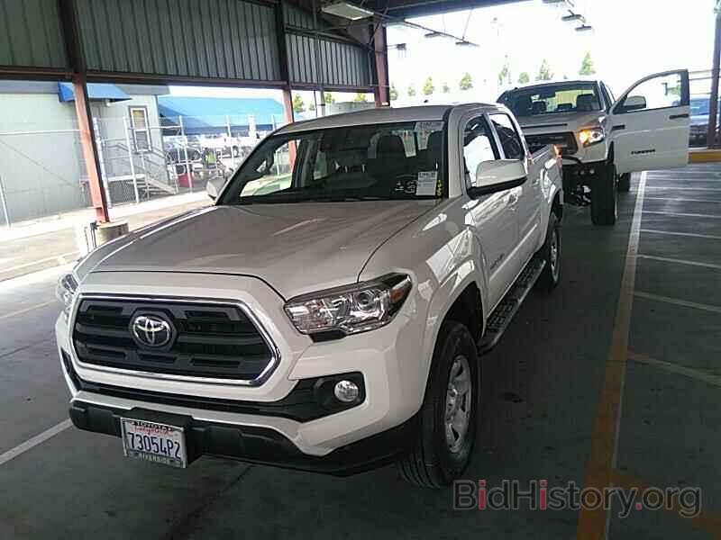 Photo 5TFAX5GN8KX134697 - Toyota Tacoma 2WD 2019